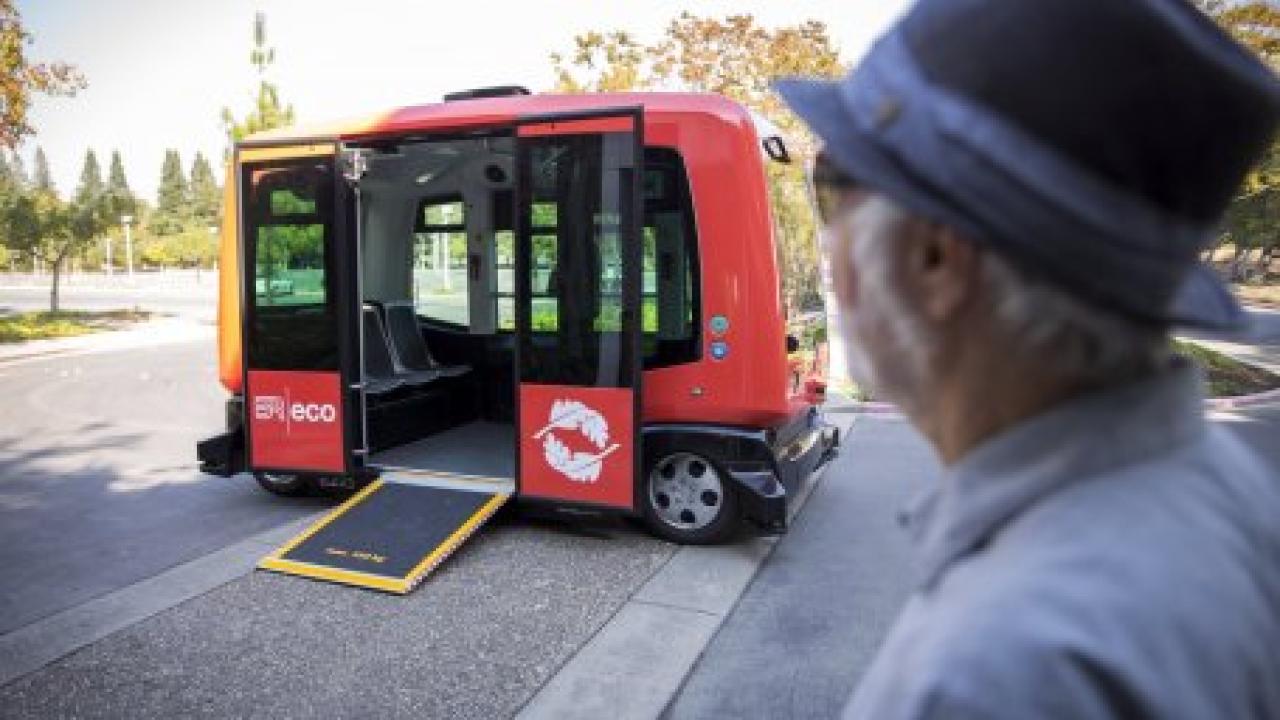 Dan Sperling, director of the Institute of Transportation Studies at UC Davis, peers at a shared, electric, and driverless shuttle operating at the Bishop Ranch Business park in San Ramon. Joseph Proudman/UC Davis Dan w 3 R