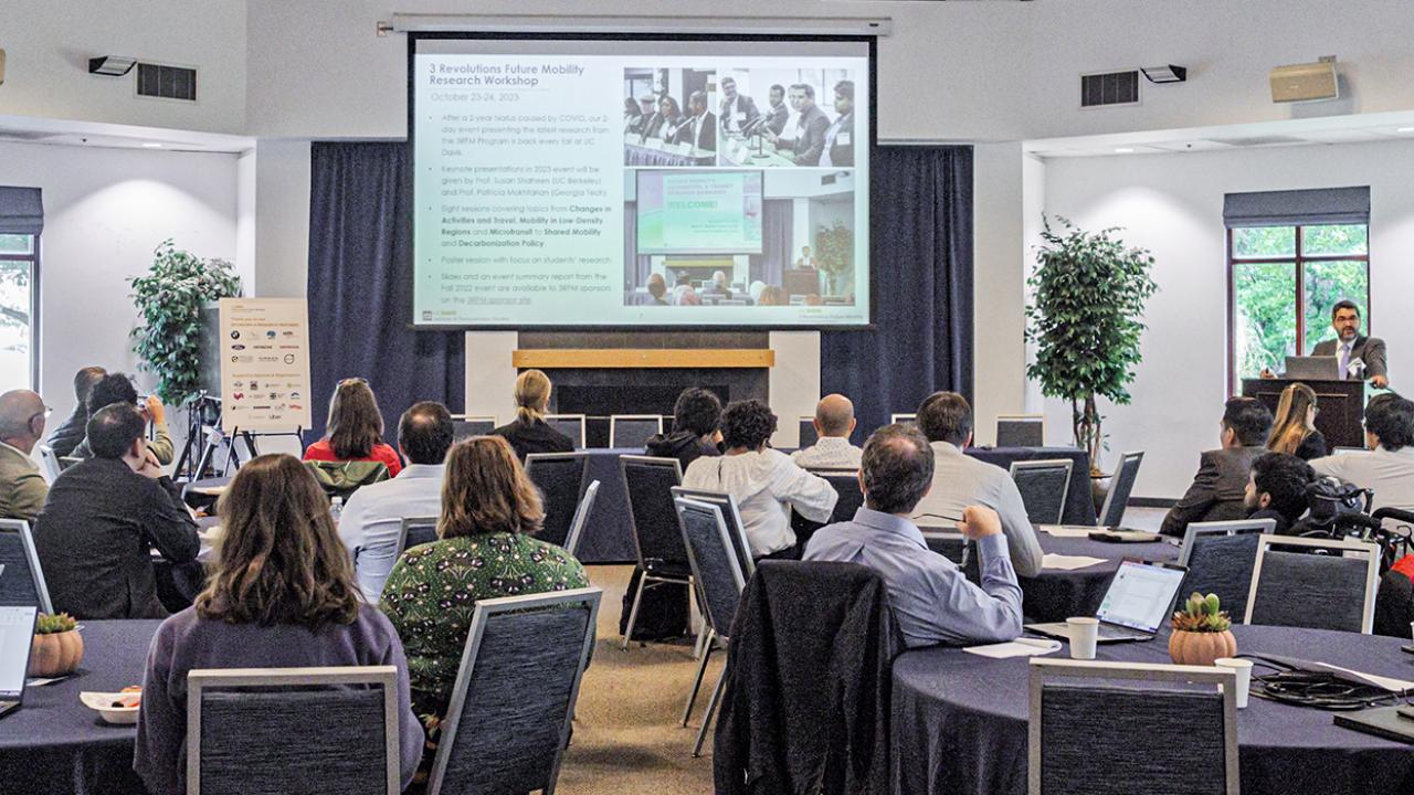 Giovanni Circella presents to a full room at the 2023 3 Revolutions Future Mobility Program Workshop